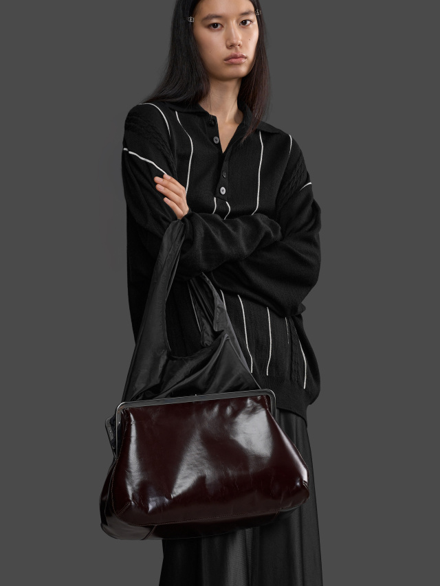 Tiniko Clutch Bag